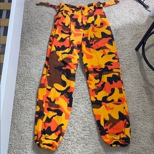 Fashion Nova camouflage pants with belt buckles
